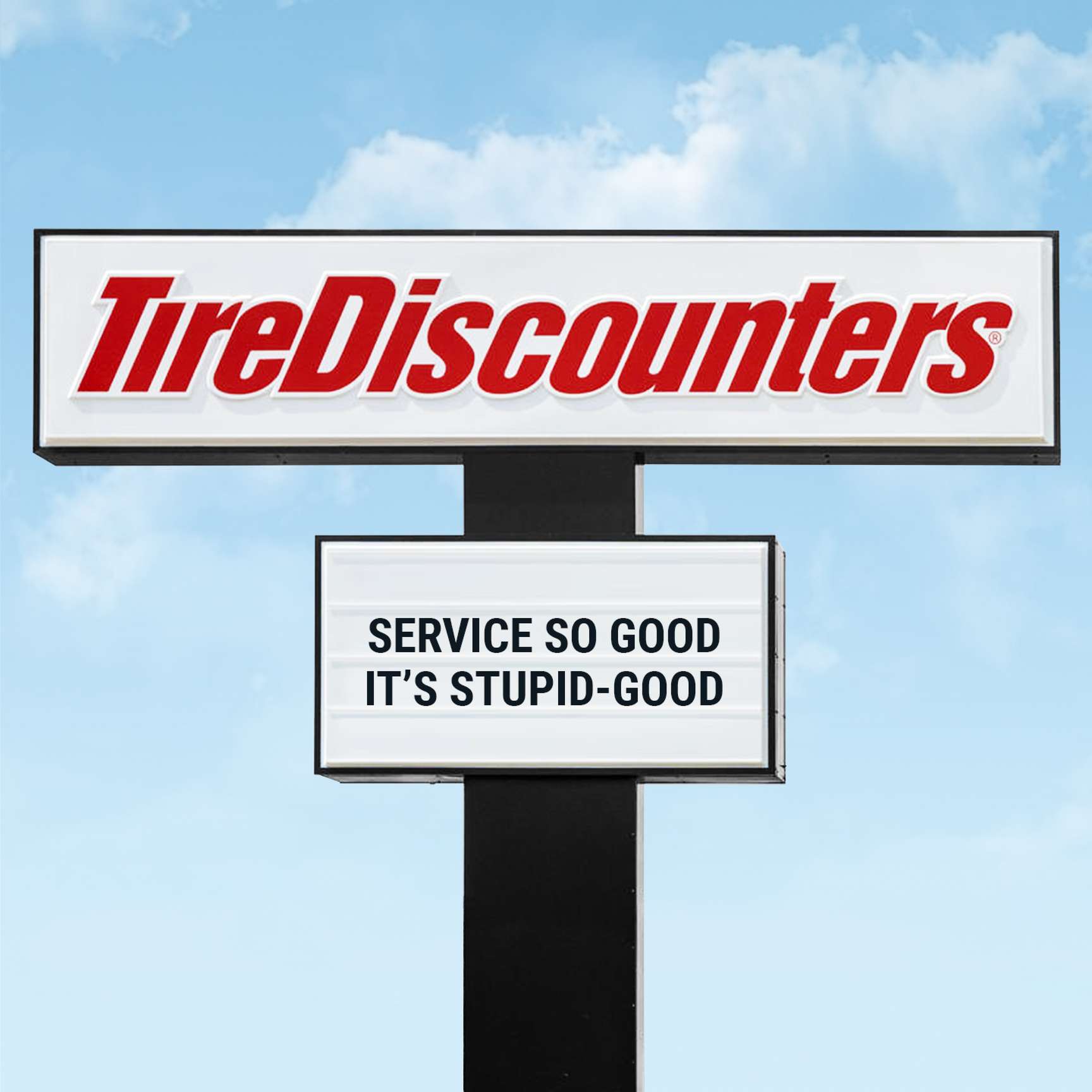 Tire Discounters marquee sign that reads "Service so good it's stupid-good."