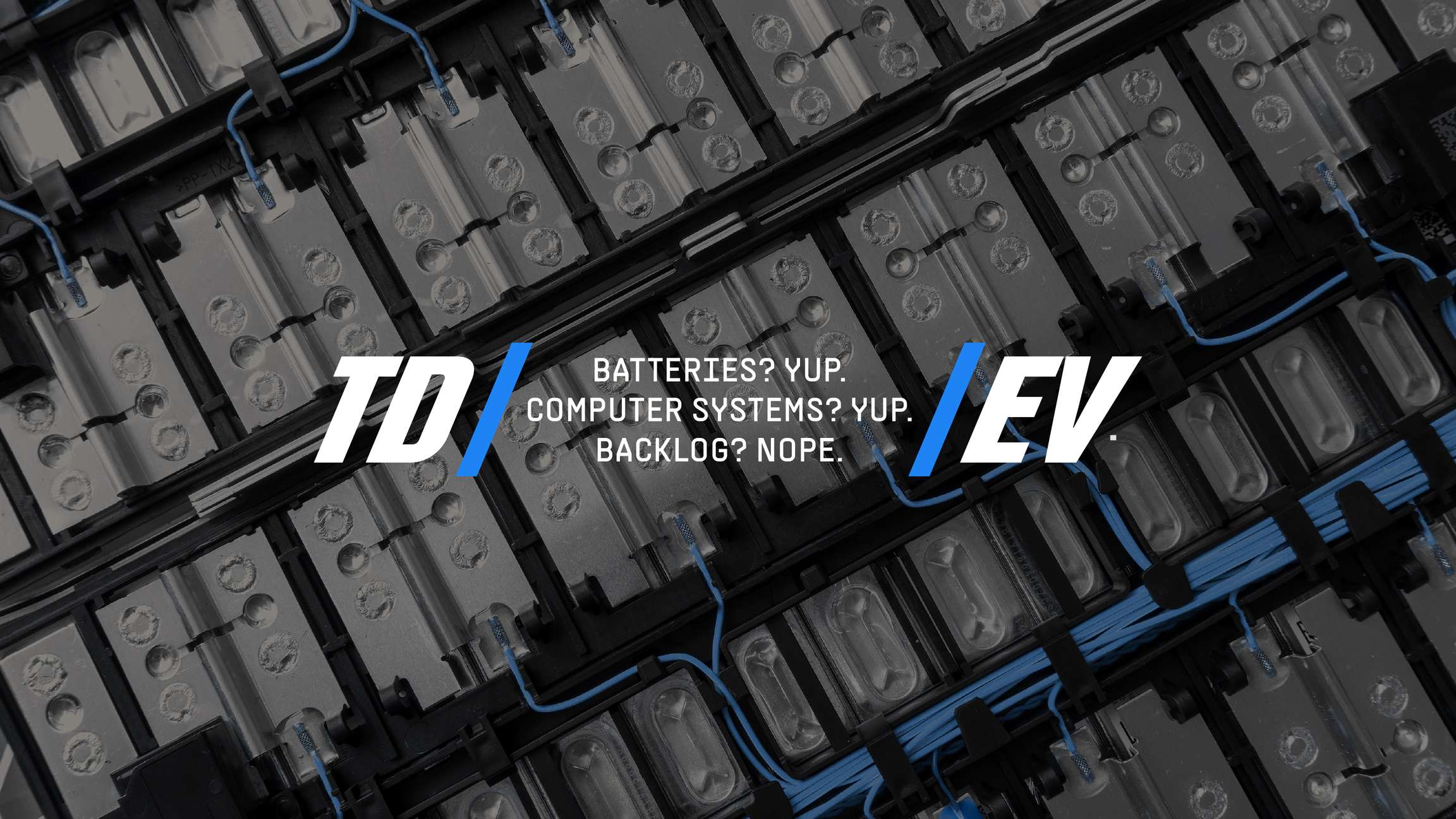 TD/EV graphic that reads "Batteries? Yup. Computer Systems? Yup. Backlog? Nope."