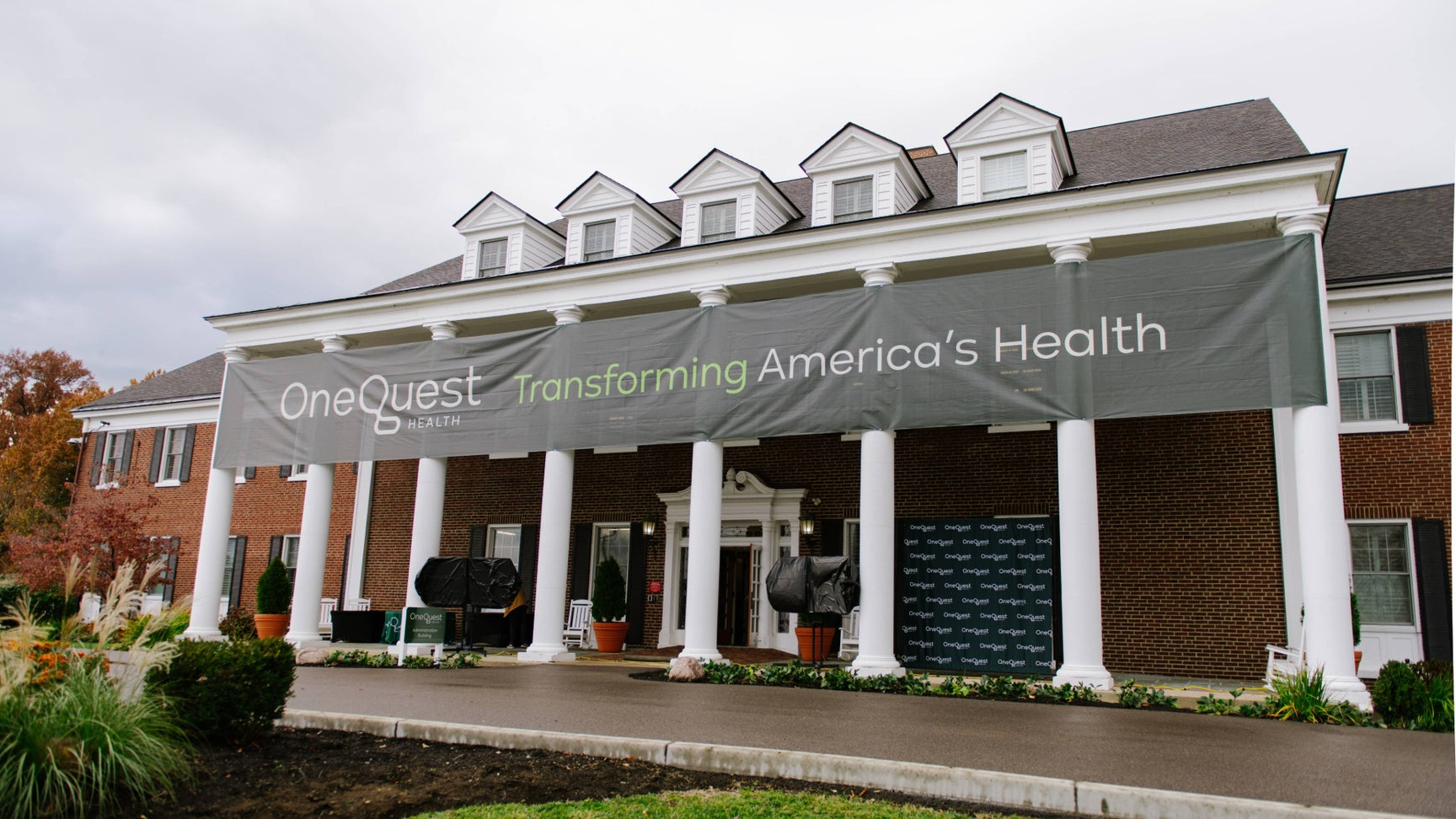 OneQuest Health Transforming America's Health giant Devou Park banner.