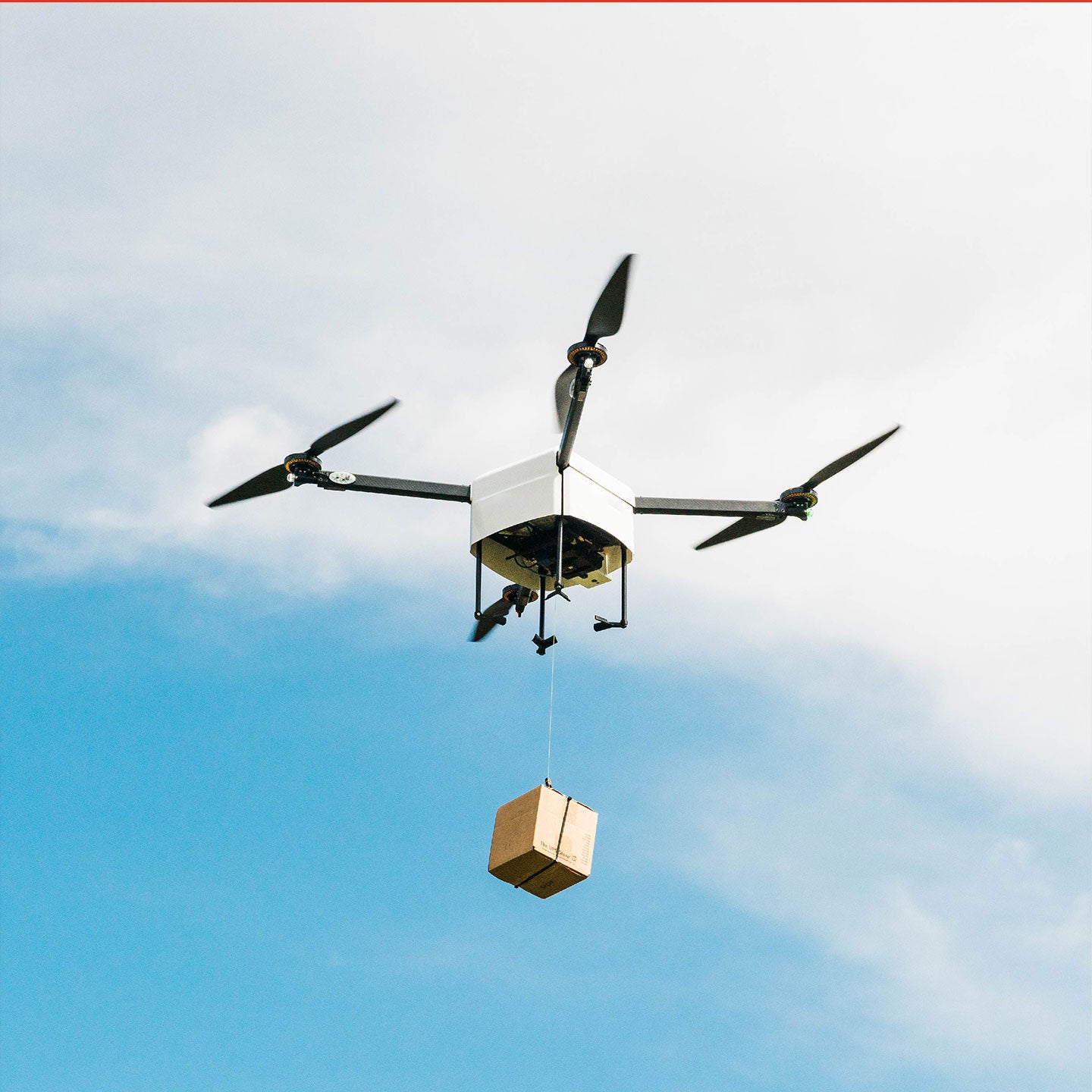 workhorse ev delivery drone dropping a package